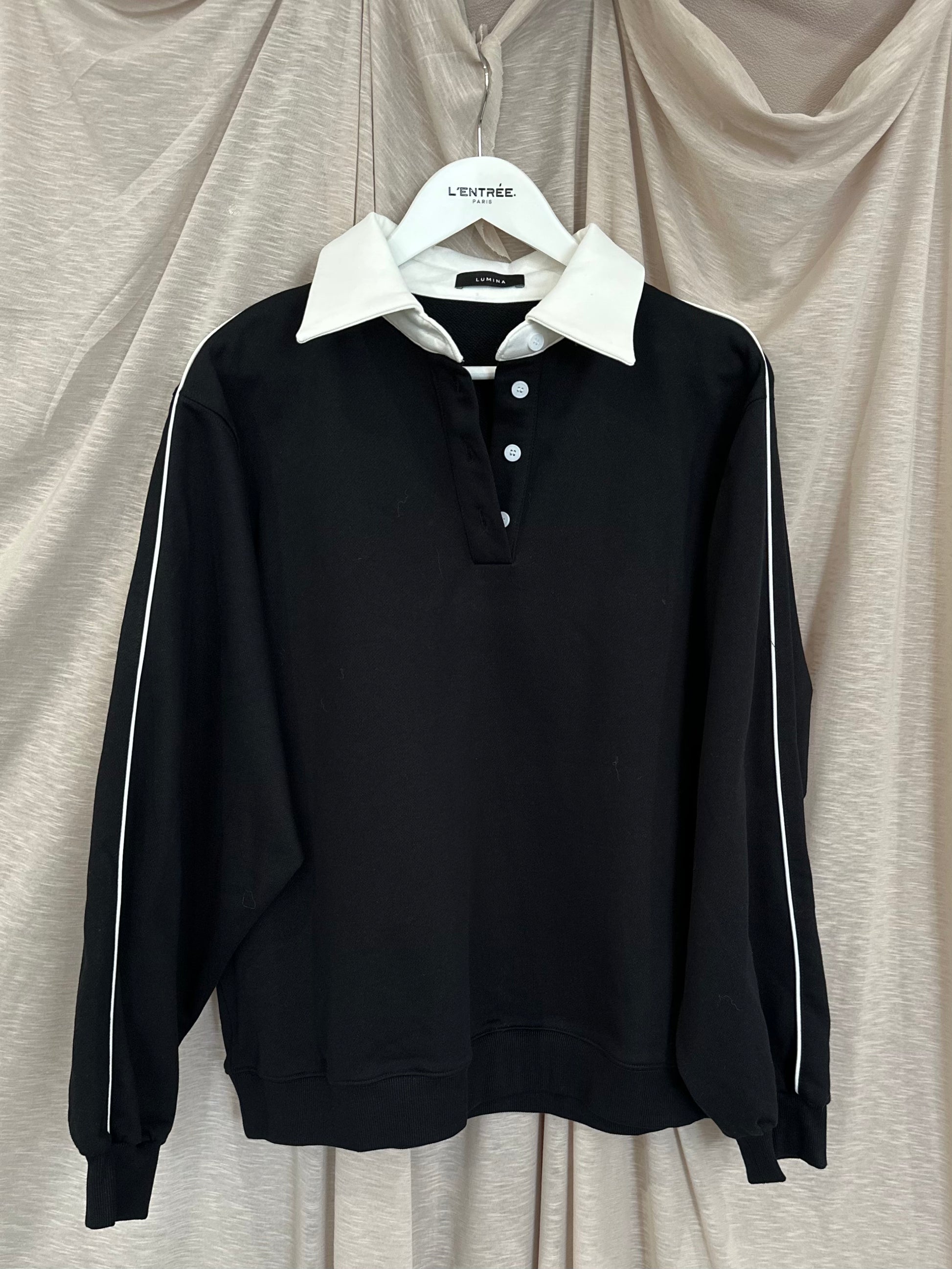 Sweat-shirt noir à col polo bicolore