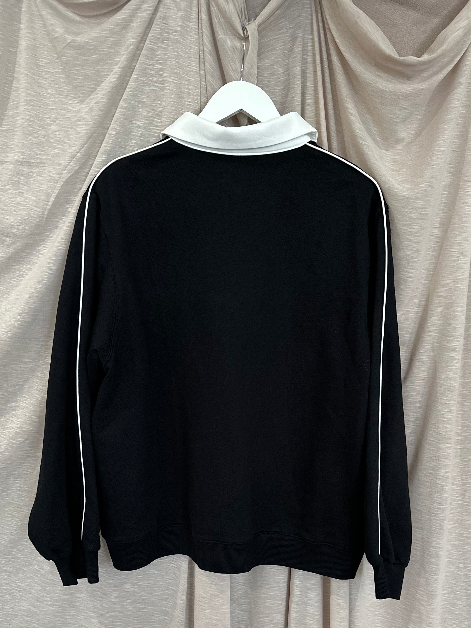 Sweat-shirt noir à col polo bicolore